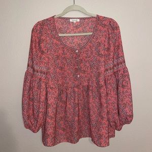 Pink floral patterned long sleeved shirt